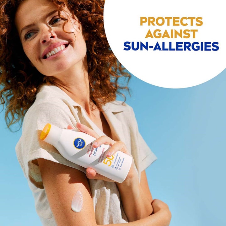 NIVEA Sun Sensitive Immediate Protect Lotion 200 ml solkrem med SPF 50 som beskytter mot solallergi påført på arm.