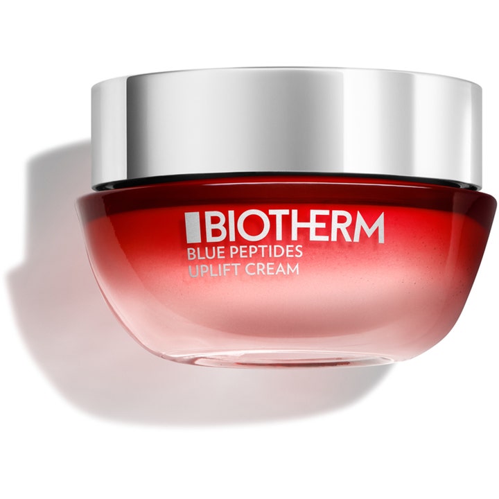 Biotherm Blue Peptides Uplift Cream oppstrammende ansiktskrem i en rød og rosa glasskrukke med et blankt sølvlokk