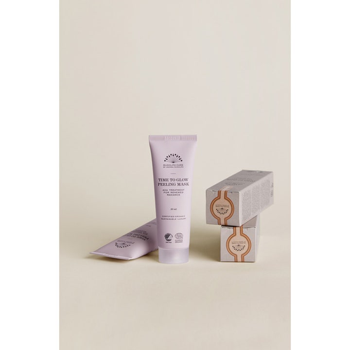 Rudolph Care Time to Glow Peeling Mask 50 ml eksfolierende ansiktsmaske i lys lilla tube med esker