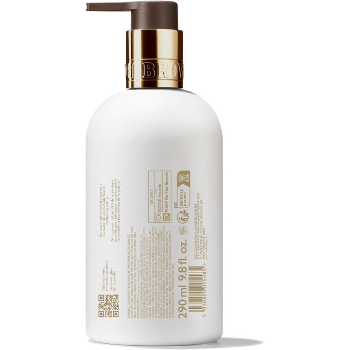 Molton Brown Milk Musk Body Lotion 300 ml fuktighetsgivende kroppskrem i hvit flaske med gullpumpe og ingrediensliste
