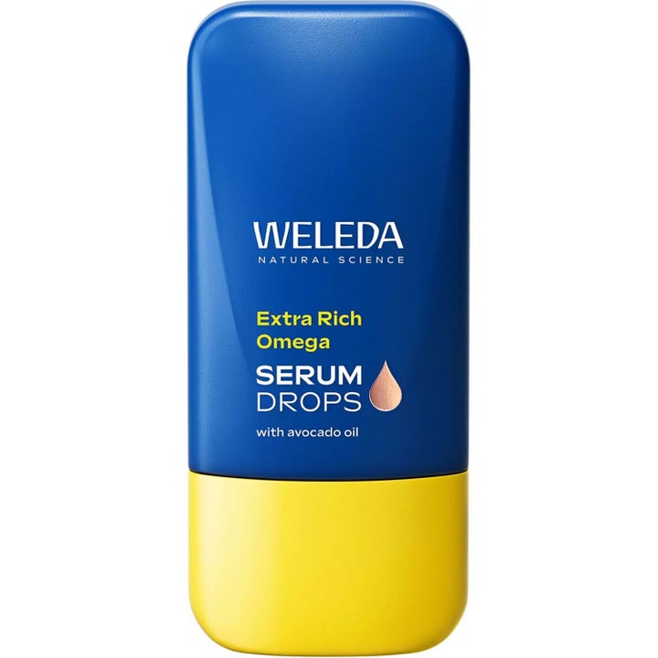 Weleda Extra Rich Omega Serum Drops nærende ansiktsserum som gir fuktighet i en blå og gul flaske med avrundet form