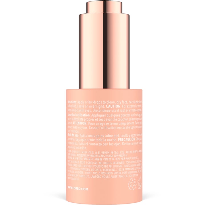 FOREO SUPERCHARGED Overnight Skin Repair Face Oil 30 ml reparerende ansiktsolje i ferskenfarget flaske sett fra baksiden