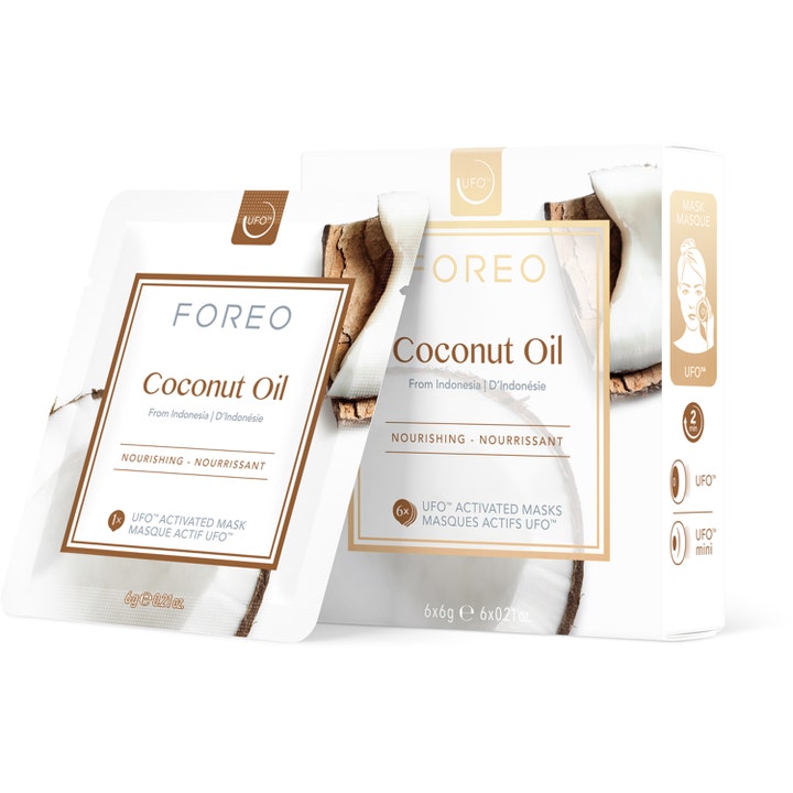 FOREO Coconut Oil 6x6g næringsgivende ansiktsmaske i hvit eske og pose dekorert med fersk kokosnøtt