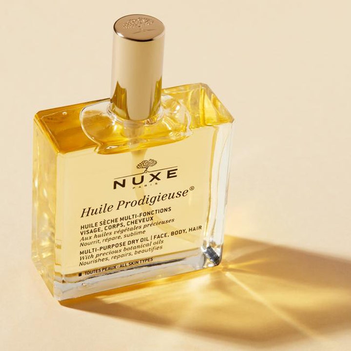 Nuxe Huile Prodigieuse 100 ml nærende tørrolje i elegant firkantet glassflaske med gullkork