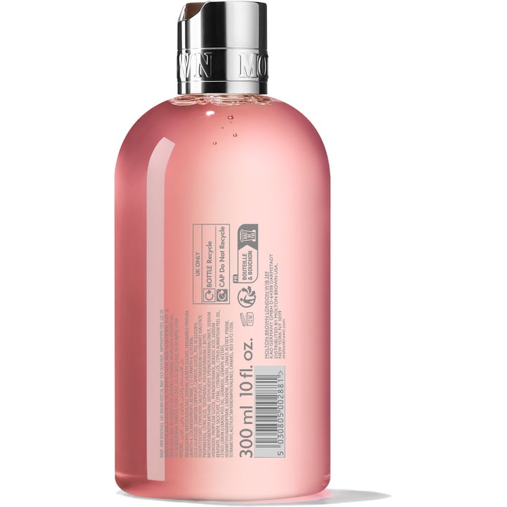 Molton Brown Delicious Rhubarb & Rose 300 ml dusjsåpe baksiden av flasken med rosa gelé og sølvfarget kork