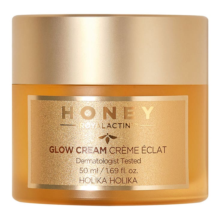 Holika Holika Honey Royalactin Glow Cream 50 ml glødgivende ansiktskrem i en gyllen glasskrukke med gullfarget lokk