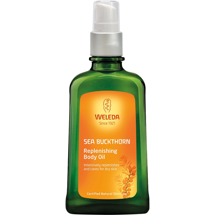 Weleda Sea Buckthorn Replenishing Body Oil 100ml nærende kroppsolje i grønn glassflaske med oransje etikett og pumpe.