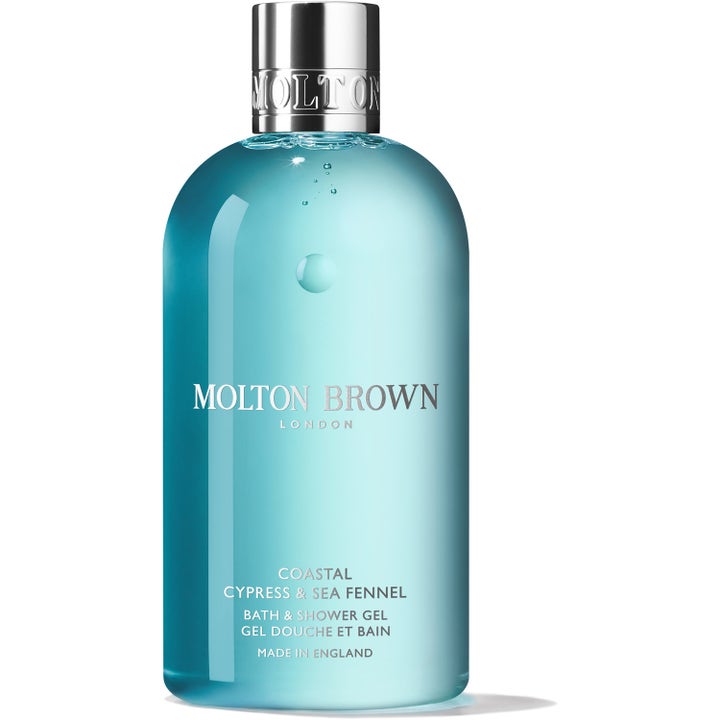 Molton Brown Coastal Cypress & Sea Fennel oppfriskende dusjsåpe i klar flaske med turkis gelé og sølvfarget kork