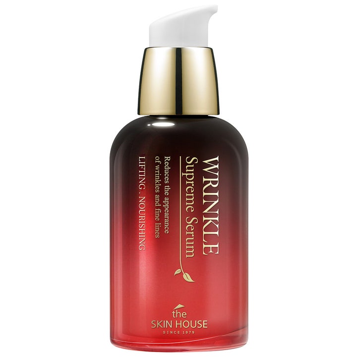 The Skin House Wrinkle Supreme Serum 50ml nærende serum som reduserer rynker i en rød og sort gradientflaske med gullpumpe