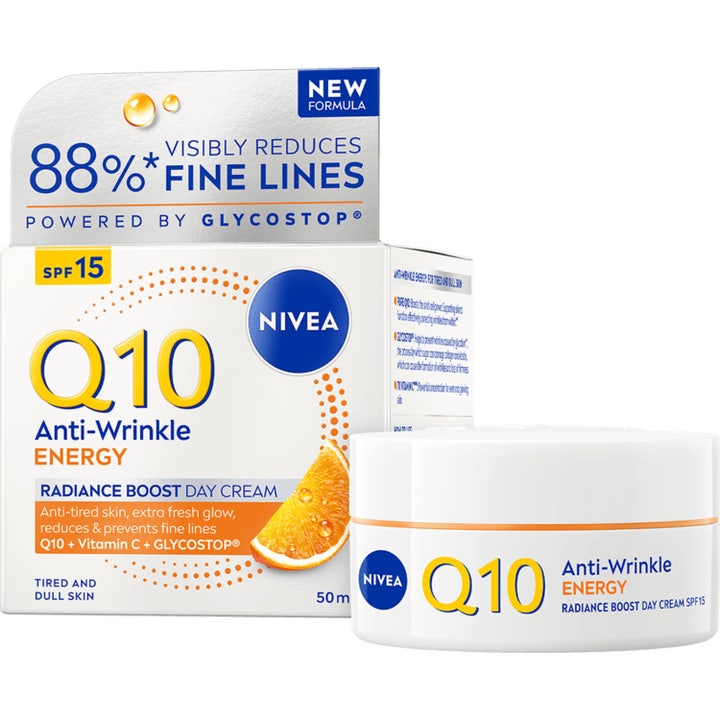 Nivea Q10 Anti-Wrinkle Energy 50 ml glødgivende dagkrem i hvit krukke og eske med oransje detaljer og appelsin