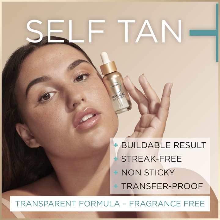 Garnier Ambre Solaire Natural Bronzer Self-Tan Drops 30 ml i glassflaske holdt av kvinne for glød