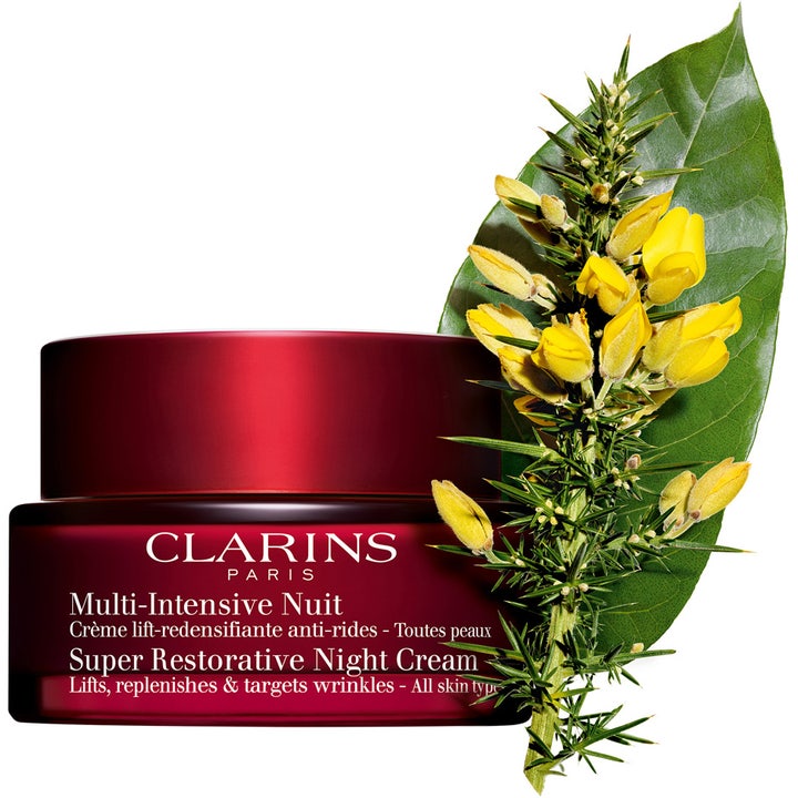 Clarins Super Restorative Night Cream 50 ml nattkrem i rød krukke med gule blomster og grønt blad