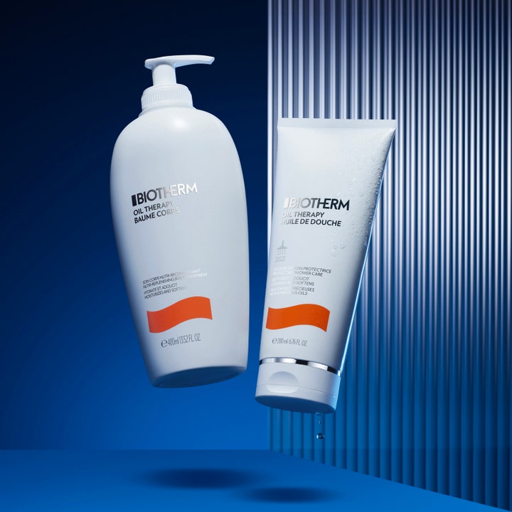 Biotherm Oil Therapy Baume Corps 200 ml fuktighetsgivende dusjolje i hvit tube med vanndråper og oransje detalj