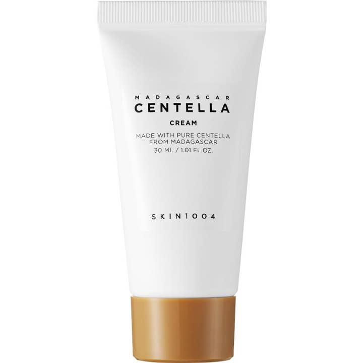 Skin1004 Madagascar Centella Cream 30 ml beroligende ansiktskrem i hvit tube med gullfarget kork