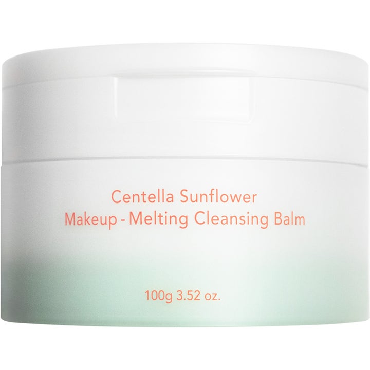 Centella Sunflower Makeup-Melting Cleansing Balm 100g rens i hvit krukke med grønn bunn og ferskenfarget tekst.