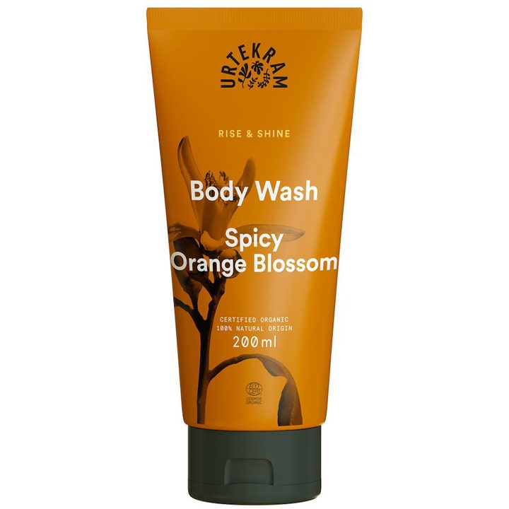 Urtekram Rise & Shine Body Wash 200 ml pleiende dusjsåpe i oransje tube med bilde av en blomst.