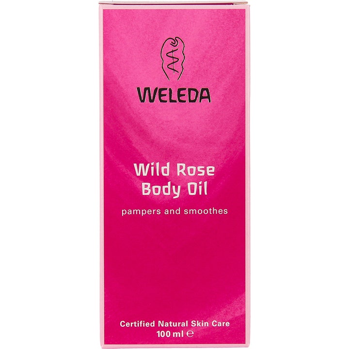 Weleda Wild Rose Body Oil 100 ml pleiende kroppsolje i rosa ytterforpakning som pleier og glatter ut huden