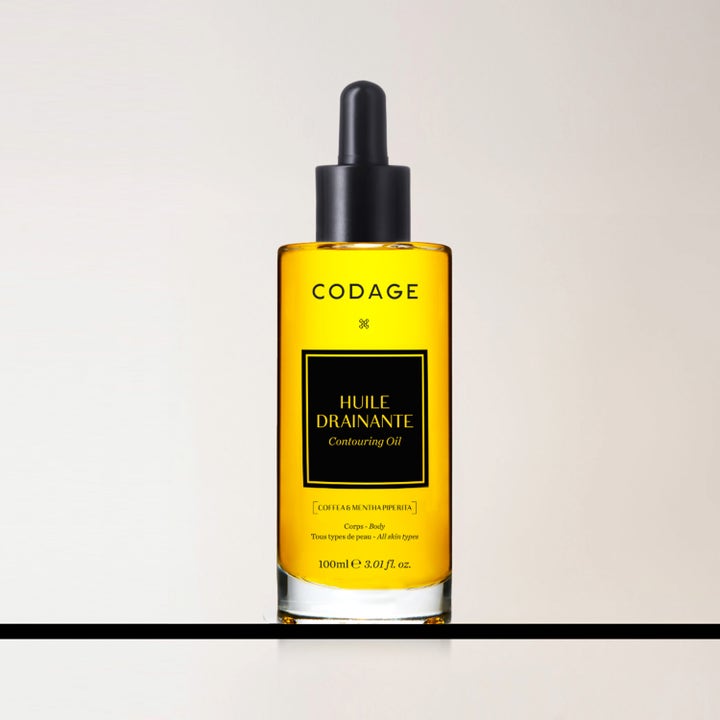 Codage Paris Relaxing Oil 100 ml drenerende kroppsolje i glassflaske med gul olje og svart pipette