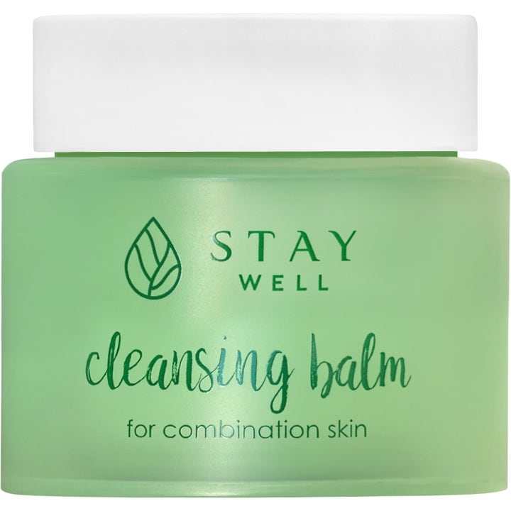 Stay Well Cleansing Balm for kombinert hud er en rensende ansiktsbalm i en grønn frostet krukke med hvitt lokk.