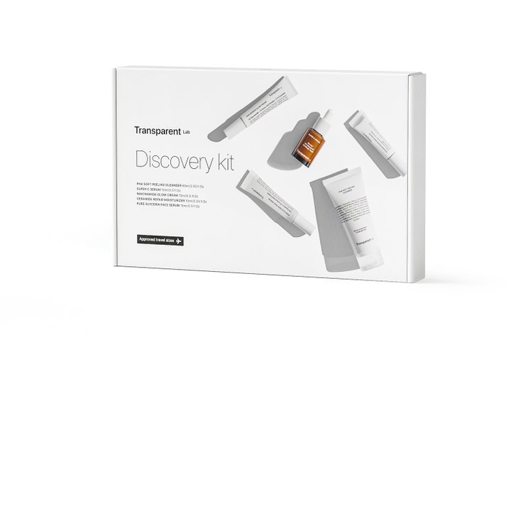 Transparent Lab Discovery Kit 5 produkter hudpleiesett i hvit eske med tuber og serum som gir fuktighet og glød