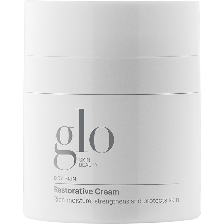 Glo Skin Beauty Restorative Cream fuktighetskrem for tørr hud i en hvit krukke som gir rik fuktighet og styrker huden.