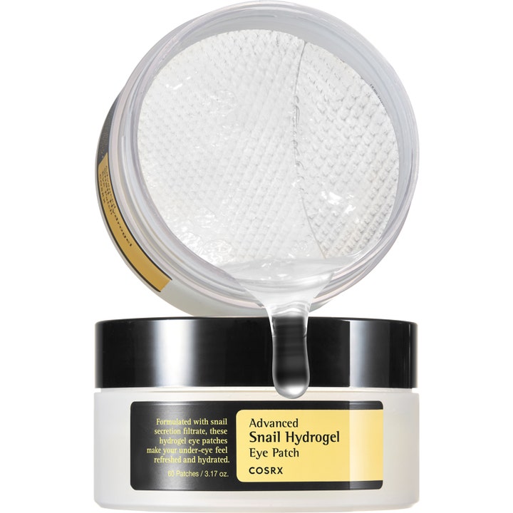 COSRX Advanced Snail Hydrogel Eye Patches 60 stk fuktighetsgivende øyelapper i åpen krukke med dråpe av snigelslim