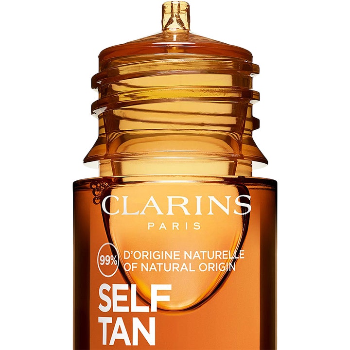 Clarins Radiance-Plus Golden Glow Booster 15 ml tanning drops i en ravfarget flaske som gir naturlig glød