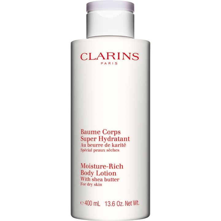 Clarins Moisture-Rich Body Lotion 400 ml fuktighetsgivende krem med sheasmør for tørr hud i hvit flaske med rød tekst.