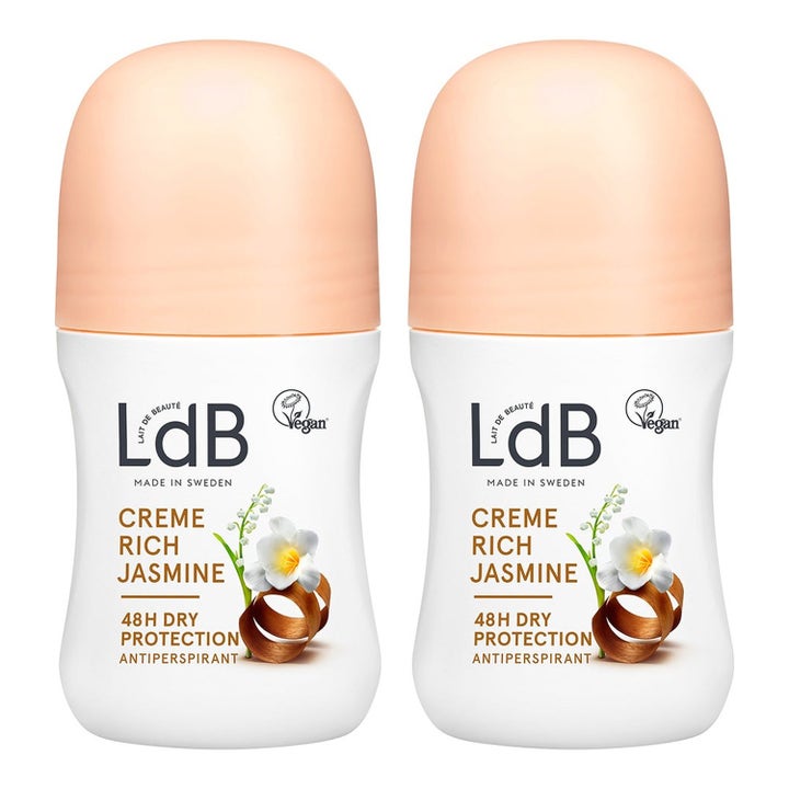 LdB Creme Rich Jasmine 2x50ml antiperspirant gir 48 timers tørrhet i to hvite roll-on flasker med ferskenfarget kork.