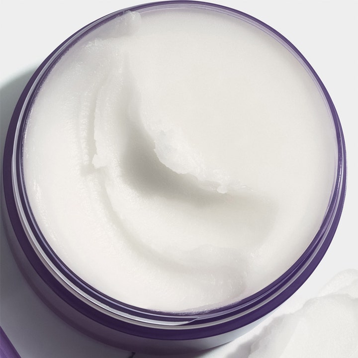 Clinique Take The Day Off Cleansing Balm 125 ml effektiv sminkefjerner med hvit fast tekstur i lilla krukke
