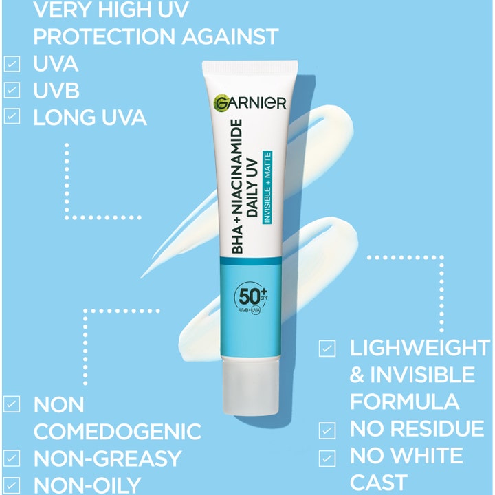 Garnier Pureactive BHA + Niacinamide UV Daily Fluid 40 ml solkrem med SPF 50+ og matt finish vist med hvit kremtekstur.