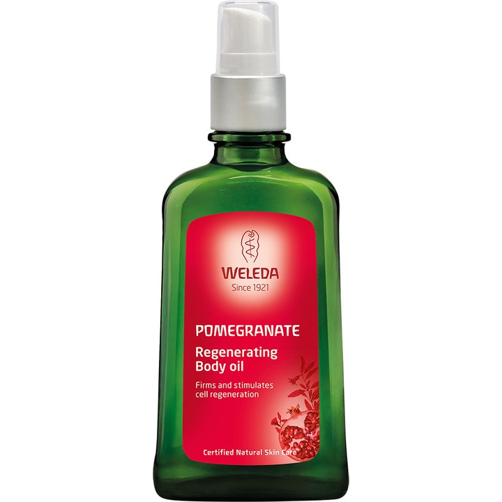 Weleda Pomegranate Regenerating Body Oil 100 ml oppstrammende kroppsolje i mørkegrønn glassflaske med rød etikett og pumpe