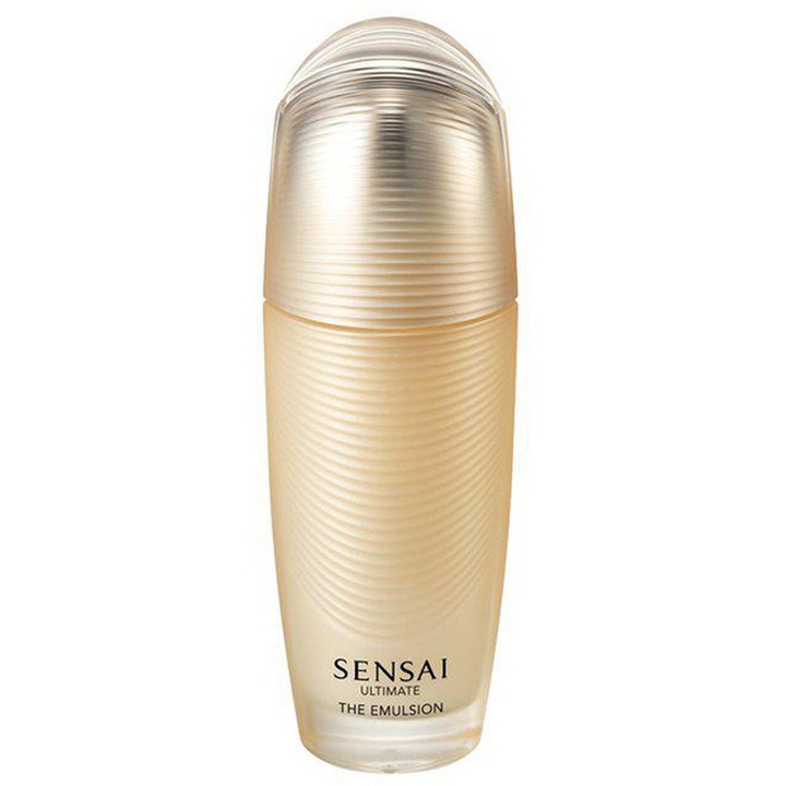 Sensai Ultimate The Emulsion 100ml fuktighetsgivende ansiktsemulsjon i en gyllen riflet flaske med transparent kork