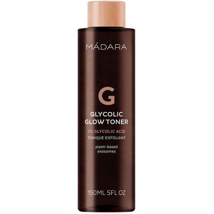 Mádara Glycolic Glow Toner 150ml eksfolierende ansiktsvann som gir glød i en mørkebrun flaske med ferskenfarget kork