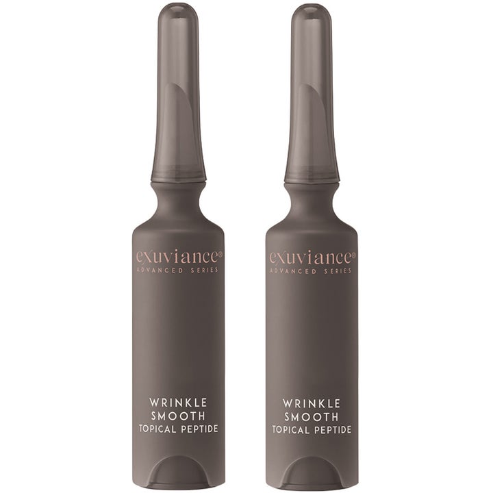 Exuviance Wrinkle Smooth Topical Peptide konsentrat mot rynker i to grå ampuller med tynn tupp
