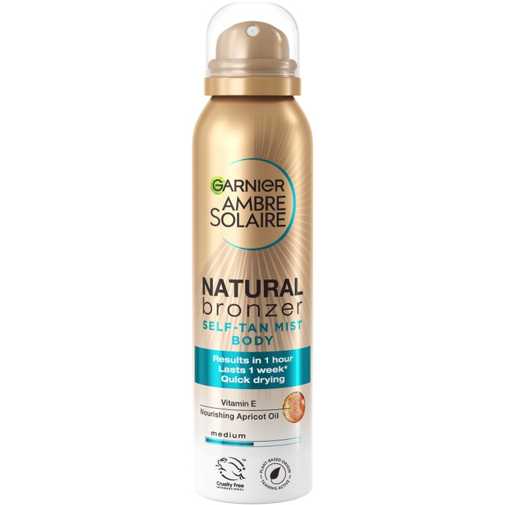 Garnier Ambre Solaire Natural Bronzer 150ml selvbruningsspray gir naturlig glød i en gullfarget flaske med klar kork.