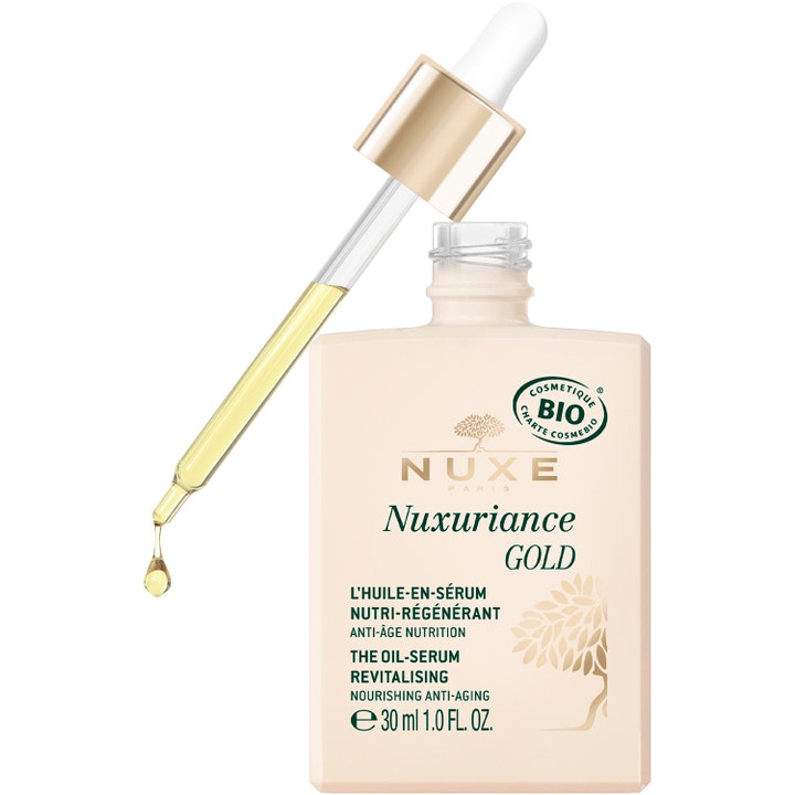 Nuxe Nuxuriance Gold Serum 30 ml nærende anti-age ansiktsserum i beige flaske med pipette og gyllen oljedråpe