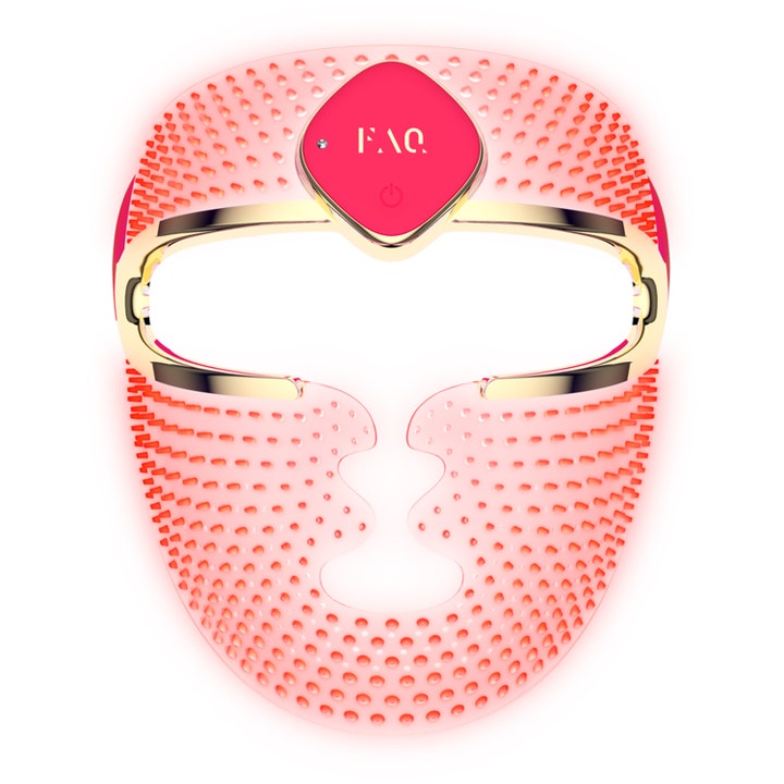 FAQ 202 LED Mask hudfornyende silikonmaske i rosa med gullramme og synlige røde lyspunkter