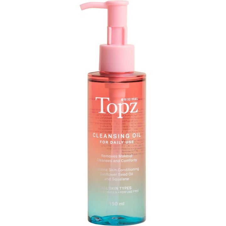 Topz Original Cleansing Oil 150 ml renseolje som fjerner sminke i en rosa og blå gradient flaske med rosa pumpe.