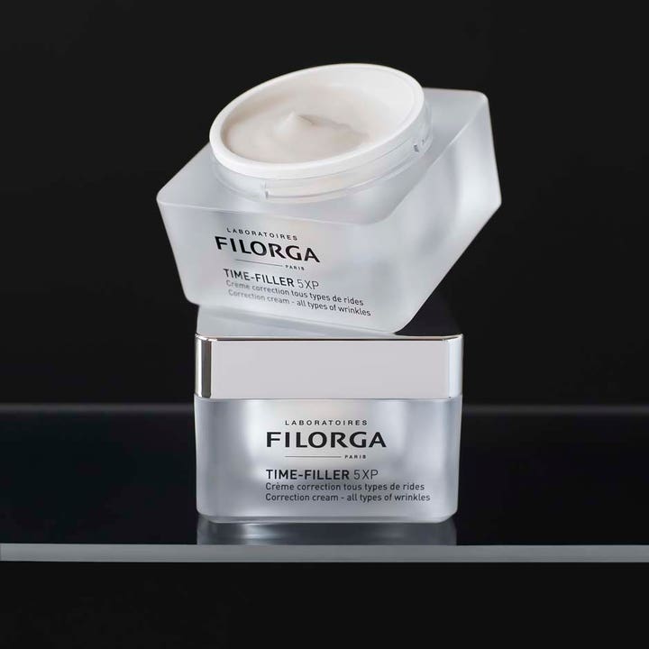 Filorga Time-Filler 5XP Cream 50 ml rynkekorrigerende ansiktskrem i frostet krukke med synlig hvit tekstur og sølvlokk