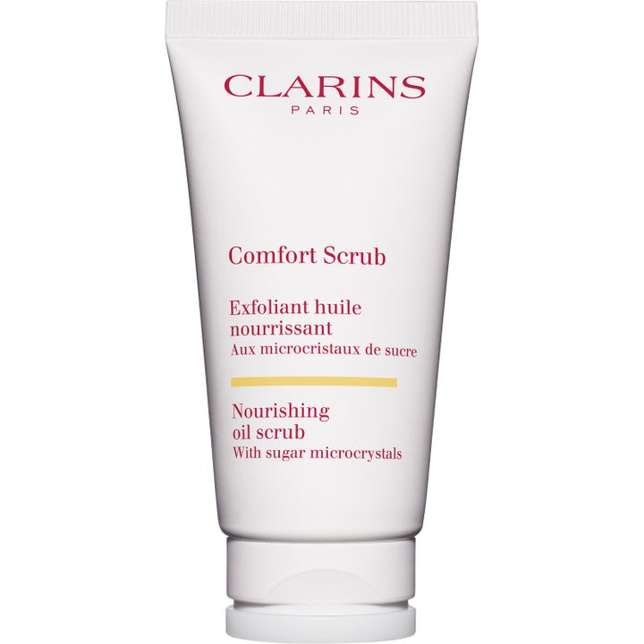 Clarins Comfort Scrub 50 ml nærende ansiktsskrubb i hvit tube med rød tekst og gul detalj