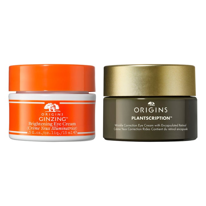 Origins GinZing og Plantscription 15 ml øyekremer som gir glød og korrigerer rynker i hvit oransje og grønn krukke.