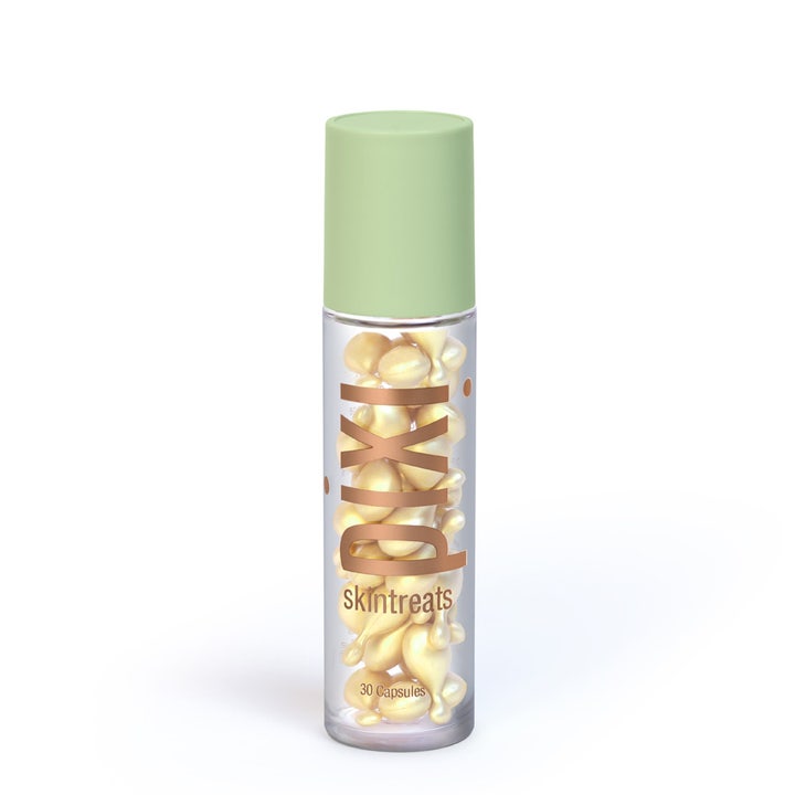 Pixi Skintreats 30 kapsler glødgivende ansiktsserum i gjennomsiktig beholder med mintgrønt lokk og gylne serumkapsler
