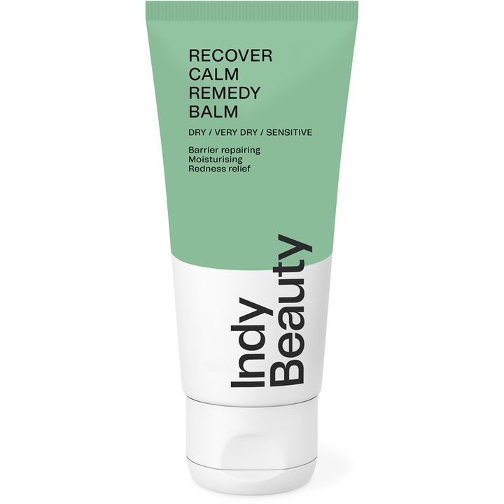 Indy Beauty Recover Calm Remedy Balm beroligende ansiktskrem som gir fuktighet i en grønn og hvit tube med hvit kork.