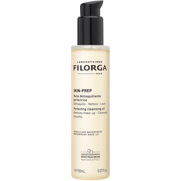 Filorga Skin-Prep Perfecting Cleansing Oil 150 ml rengjøringsolje fjerner sminke i gjennomsiktig flaske med svart pumpe.