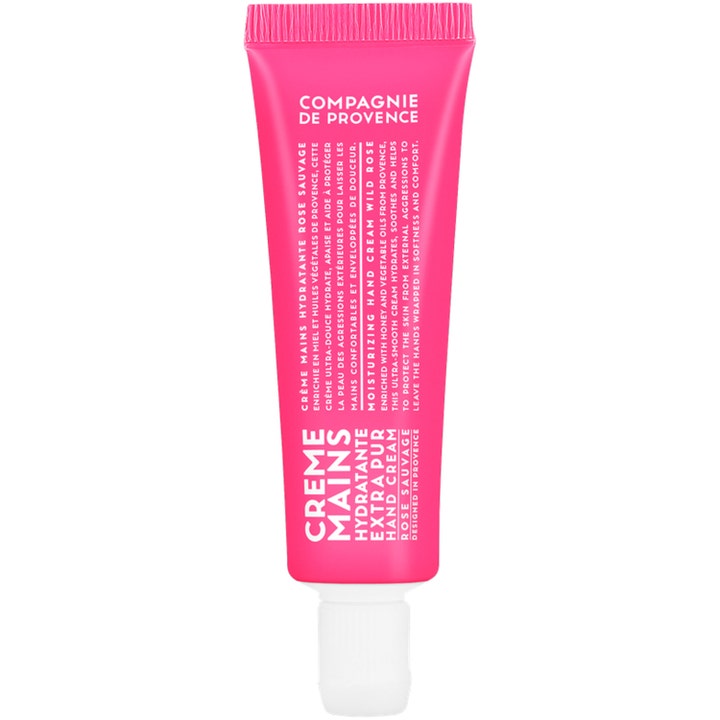 Compagnie de Provence Moisturizing Hand Cream Wild Rose fuktighetsgivende håndkrem i rosa tube med hvit kork