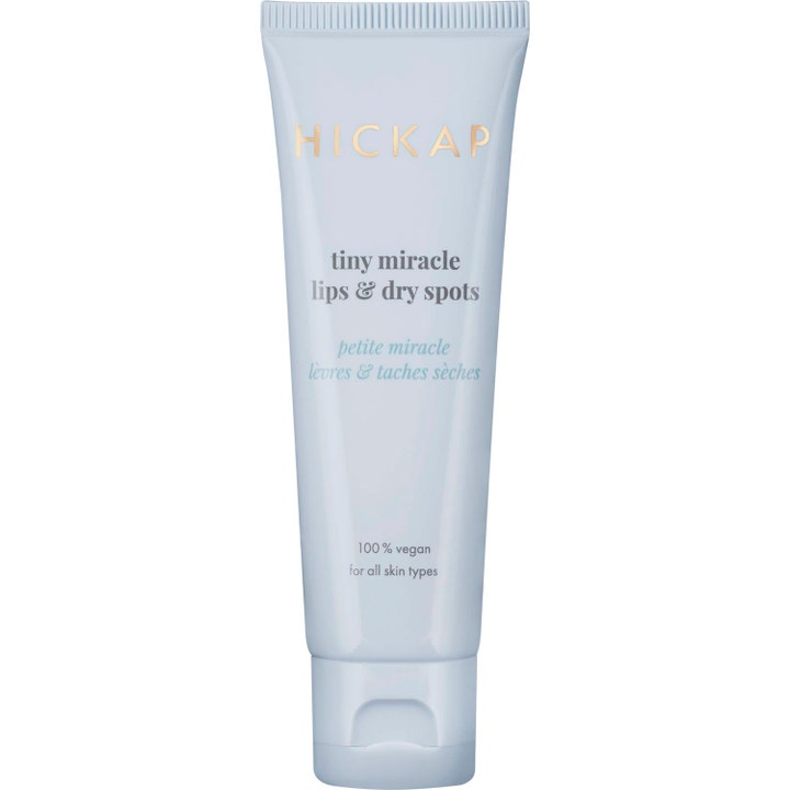 Hickap Tiny Miracle Lips & Dry Spots 15 ml pleiende multibalm i lyseblå tube med gulldetaljer og hvit kork