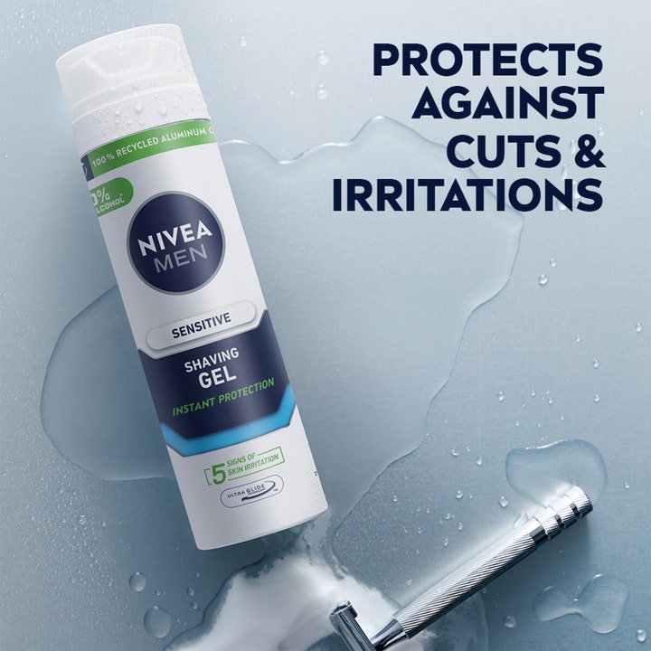Nivea Sensitive Shaving Gel 200 ml motvirker sår og irritasjon, hvit boks ved en barberhøvel og vannsprut.