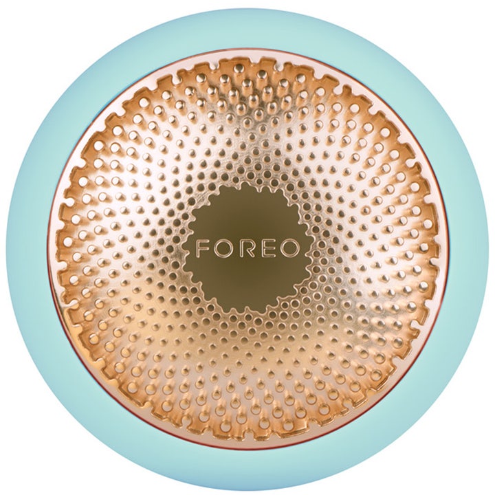Foreo UFO 1 stk smartmaske for ansiktspleie i lyseblå silikon med en strukturert rosegullfarget metallflate