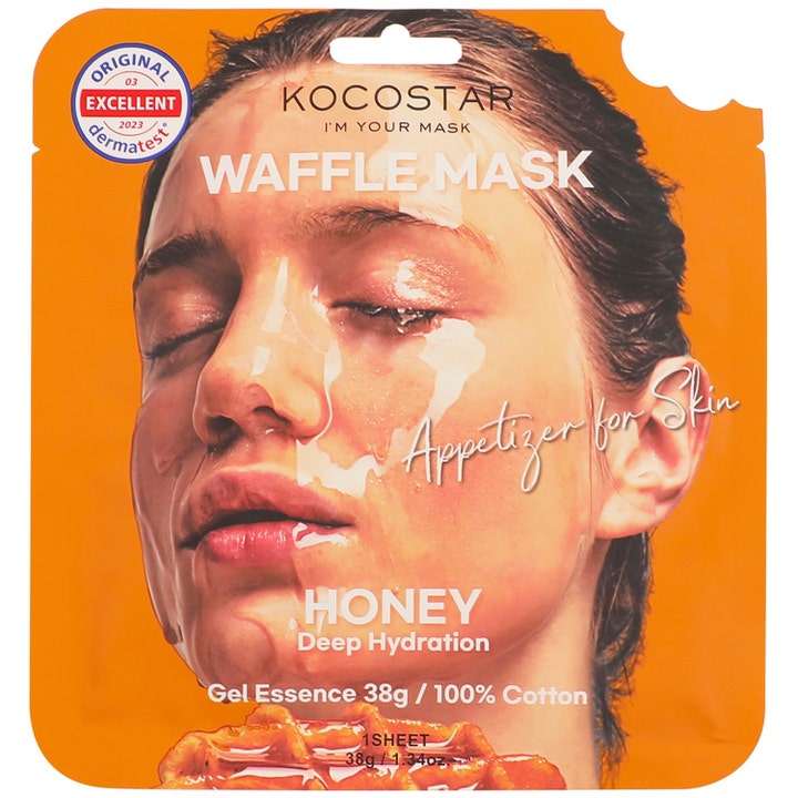 Kocostar Waffle Mask Honey 40 g fuktighetsgivende ansiktsmaske i oransje sachet med bilde av kvinne og honningvaffel